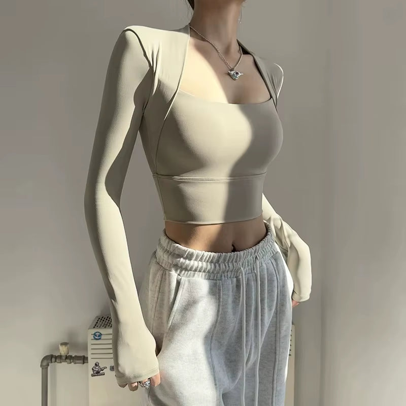 Elevate Your Workout with the Women's Long Sleeve Fitness Chest Cushion Top - Perfect for Yoga, Dance, and Gym Sessions!